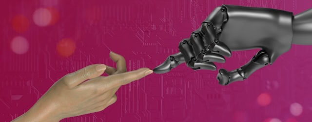 Human hand and robotic hand reaching out to touch fingers